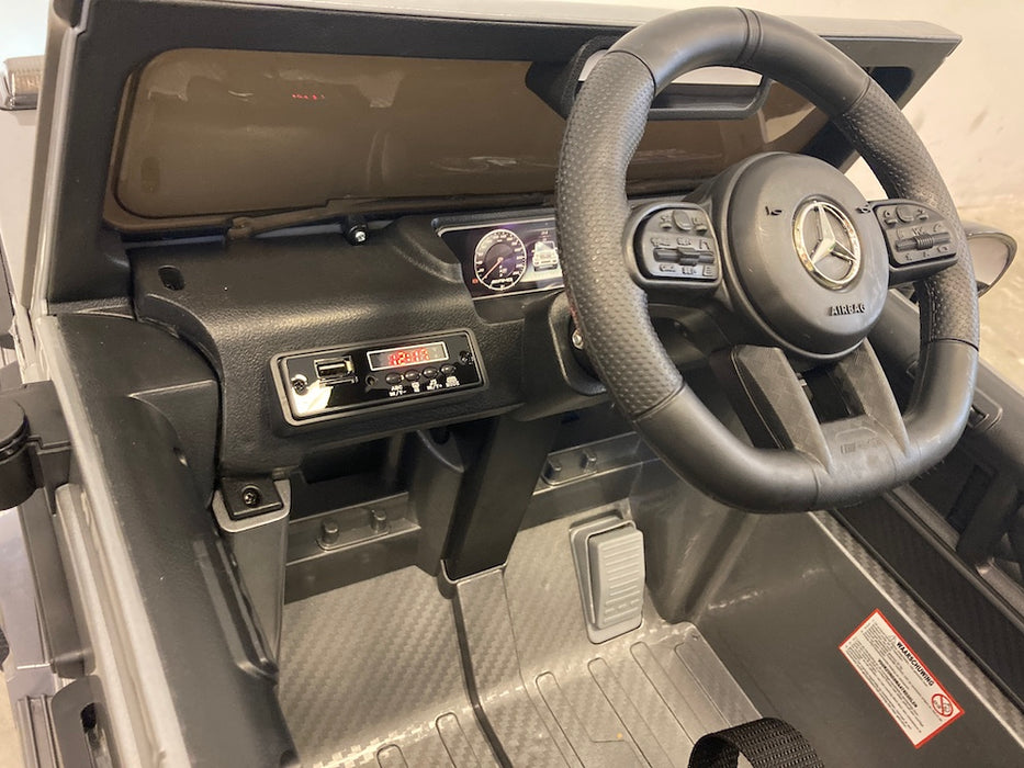 Mercedes G63 AMG Kinderauto 12V + 2.4G RC (zilvergrijs) - Trapautodealer